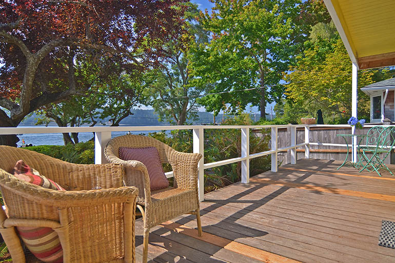 Why is decking considered to be an alternative to terraces and patios?